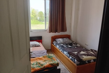 اتاق خواب با دو تخت تک نفره آپارتمان دوخوابه بهار رشت گلسار واحد ۳ | آپارتمان در رشت | ایجاره